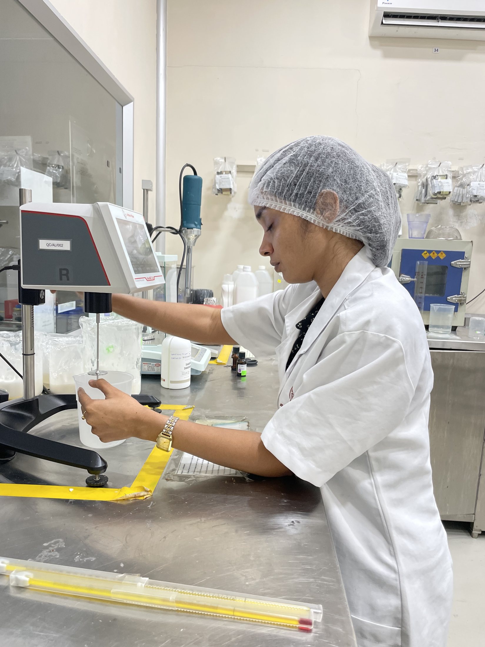 In-process cosmetics quality control checking pH, viscosity, and density